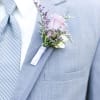 A lavender rose boutonniere with greenery to accent will be provided. Ivory