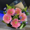 Beautiful hand wrapped bouquet freshly made for a gift or just because.