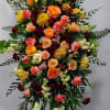 Autumn color standing spray with Lynette peach cremones, red hypericum berries, peach