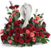 This beautiful angel arrangement shows all the love filled with gorgeous roses