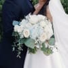 This gorgeous Bridal Bouquet has a subtle hint of blue throughout with