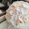 The &quot;Ivory Dream Bouquet&quot; is an exquisite hand-tied arrangement that epitomizes elegance