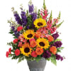 Funeral arrangement in bright, bold colors