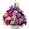 Basket of fresh flowers in shades of pinks and lavenders