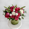 The &quot;Radiant Rose Garden Vase&quot; is a stunning arrangement that features a