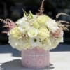 Gorgeous bouquet of white Roses, Lisianthus and Hydrangeas in stunning decorative vase