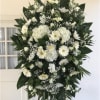 Honor a lifetime of faithful devotion with our beautiful standing sympathy arrangement.