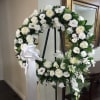 Honor a lifetime of faithful devotion with our beautiful standing sympathy arrangement.