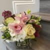 Pretty little arrangement of hydrangea, roses, tulips, orchids 