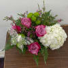 Enjoy this beautiful arrangement to start your summer off with a flutter!