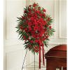 This Sympathy Standing Spray, in beautiful red, is a touching symbol of