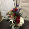Red, Lavender, White with a splash of yellow designed in a vase.