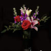Enjoy a bold and outspoken floral arrangement accommodated with premium red roses