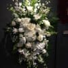 small standing spray of white flowers