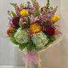 A bright and colorful arrangement. Ready to brighten anyone&rsquo;s day. 