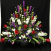 PLEASE CALL SHOP DIRECTLY FOR BUDGET PRICE OPTIONS Funeral Mache arrangement containing
