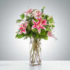 Pink lilies stand for love, admiration, compassion, and femininity. Send this sweet-smelling