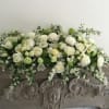 Mix of white and green cascading florals
