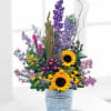 Richly radiant and vibrantly colorful, this artistic arrangement is brimming with fresh