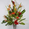 A flower arrangement that truly speaks volumes! Exotic inspired bouquet is hand-arranged