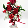 A beautiful array of Three Red Roses arranged in a Bud Vase