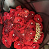 25 Red roses with diamond pins, crown, and butterflies
we have available in