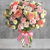 Sweet as candy! This soft pink and white bouquet is a feminine