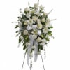 This standing spray, in elegant white and soothing greens, will serve as