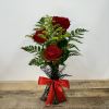 &quot;Timeless Trio&quot; features a small vase with lush greenery, elegantly showcasing three