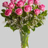 Blushing pink roses and delicate white Limonium add up to a feminine