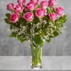 Blushing pink roses and delicate white Limonium add up to a feminine