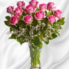 Blushing pink roses and delicate white Limonium add up to a feminine