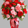 Fan the flames of love with this sizzling array of red roses