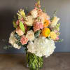 Arrangement in vase with a variety of flowers, White Lilies, Yellow Ranunculus