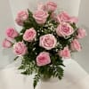 This arrangement, features exquisite pink roses. Each delicate bloom exudes grace and