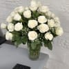 Experience the celestial beauty of our breathtaking arrangement featuring of pristine white