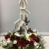 Mixed seasonal flowers with assorted church
