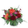 The vibrant colors in this arrangement are sure to brighten up any