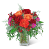 The vibrant colors in this arrangement are sure to brighten up any