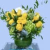 Gorgeous yellow roses and sweetheart roses with green accent flowers 