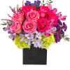 This exquisite mix of feminine blooms is like a breath of fresh