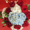 She is different! 
Hydrangeas and roses