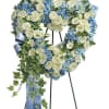 Offer comfort and tranquility with a truly special display..This heartfelt arrangement features
