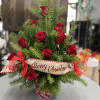 Beautiful custom made Christmas Tree with dozen red roses. Custom ribbon