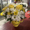 Put a smile on someone&#039;s face with this cheerful arrangement featuring a