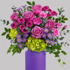 This awe-inspiring mix of roses, asters and hydrangea is sure to take