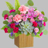 This magnificent modern flower arrangement with fabulous pink and purple blooms is