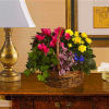 This colorful and long-lasting collection of mixed plants in a basket is