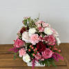 &quot;Square of Blossoms&quot; features a white vase filled with light pink, white