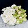 A sophisticated mix of White and Green Flowers.  Designed in one
